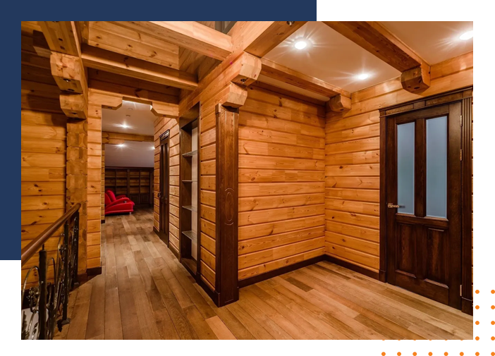 A room with wood floors and wooden walls.